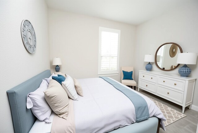 4407 Archer Meadow Ln, Sugar Land, TX 77479 - bedroom with wood finished floors