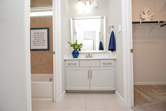 4407 Archer Meadow Ln, Sugar Land, TX 77479 - full bath featuring a spacious closet, vanity, a bath, and tile patterned flooring