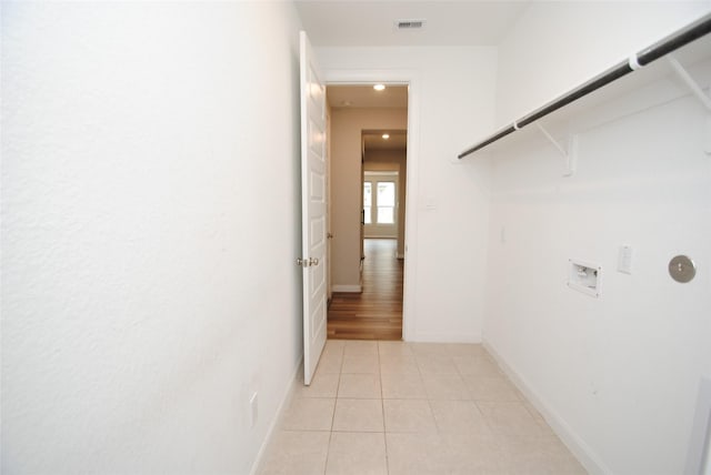 4407 Archer Meadow Ln, Sugar Land, TX 77479 - spacious closet with light tile patterned floors
