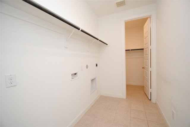 4407 Archer Meadow Ln, Sugar Land, TX 77479 - laundry area with hookup for an electric dryer, hookup for a gas dryer, hookup for a washing machine, and light tile patterned flooring