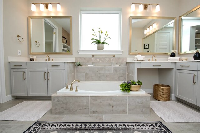 4407 Archer Meadow Ln, Sugar Land, TX 77479 - bathroom featuring vanity, a bath, and tile patterned floors