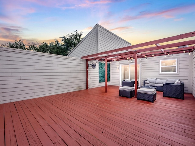 1615 S Kirkwood Rd, Houston, TX 77077 - deck at dusk featuring an outdoor hangout area and a pergola