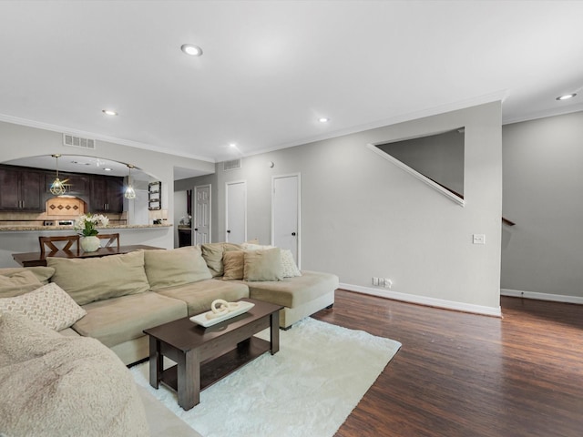 1615 S Kirkwood Rd, Houston, TX 77077 - living room featuring ornamental molding, recessed lighting, and dark wood-style flooring