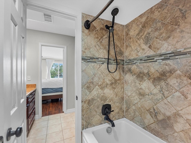 1615 S Kirkwood Rd, Houston, TX 77077 - ensuite bathroom with shower / bathtub combination, vanity, and tile patterned floors
