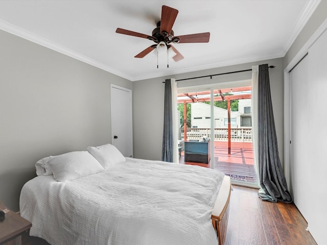 1615 S Kirkwood Rd, Houston, TX 77077 - bedroom with access to outside, crown molding, dark wood-style floors, and a ceiling fan