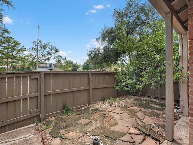 1615 S Kirkwood Rd, Houston, TX 77077 - fenced backyard with a patio area