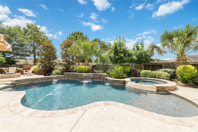 25303 Hall Meadow Ln, Katy, TX 77494 - view of swimming pool featuring a fenced backyard, a pool with connected hot tub, and a patio area