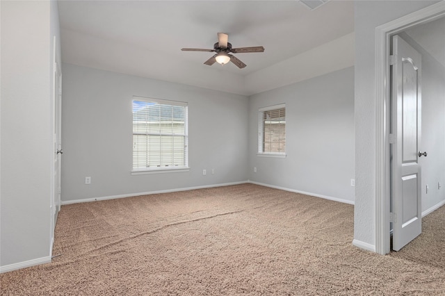 25303 Hall Meadow Ln, Katy, TX 77494 - empty room with a ceiling fan, carpet, and plenty of natural light
