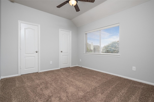 25303 Hall Meadow Ln, Katy, TX 77494 - unfurnished bedroom with lofted ceiling, carpet floors, and ceiling fan