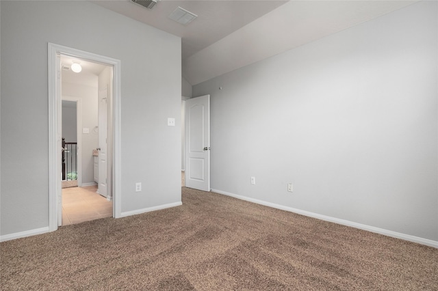 25303 Hall Meadow Ln, Katy, TX 77494 - unfurnished bedroom with light colored carpet, ensuite bathroom, and vaulted ceiling