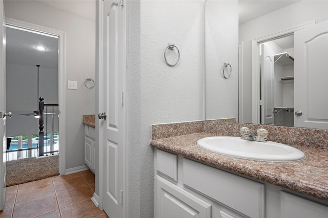 25303 Hall Meadow Ln, Katy, TX 77494 - bathroom featuring vanity, tile patterned floors, and a closet