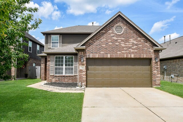 15315 Signal Ridge Way, Cypress, TX 77429 - traditional-style home with brick siding, concrete driveway, a front lawn, and an attached garage