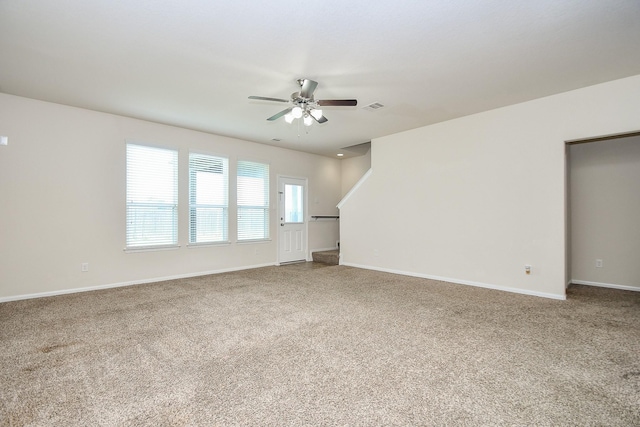 15315 Signal Ridge Way, Cypress, TX 77429 - unfurnished living room featuring carpet and ceiling fan