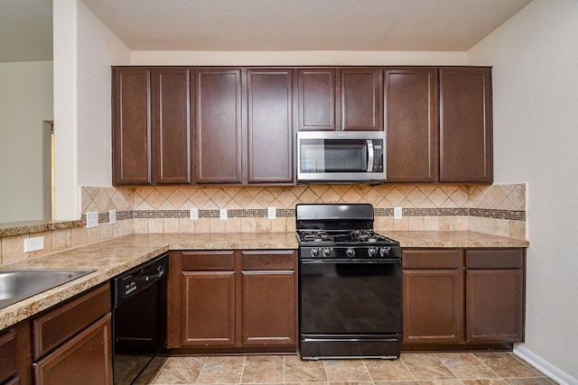 15315 Signal Ridge Way, Cypress, TX 77429 - kitchen with black appliances, backsplash, and dark brown cabinets