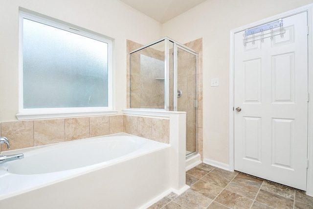 15315 Signal Ridge Way, Cypress, TX 77429 - full bathroom featuring a bath, plenty of natural light, and a stall shower