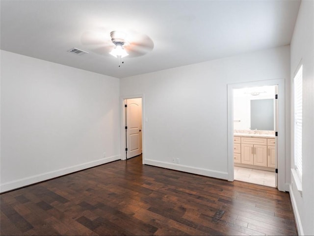 5708 Dolores St Unit A, Houston, TX 77057 - unfurnished bedroom featuring dark wood-style floors and ensuite bath