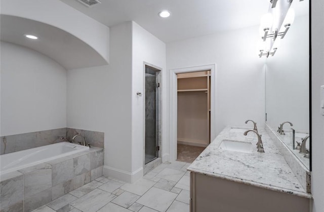 5708 Dolores St Unit A, Houston, TX 77057 - full bath featuring double vanity, a garden tub, a walk in closet, a stall shower, and recessed lighting