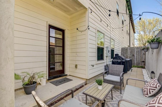 5708 Dolores St Unit A, Houston, TX 77057 - view of patio featuring a grill