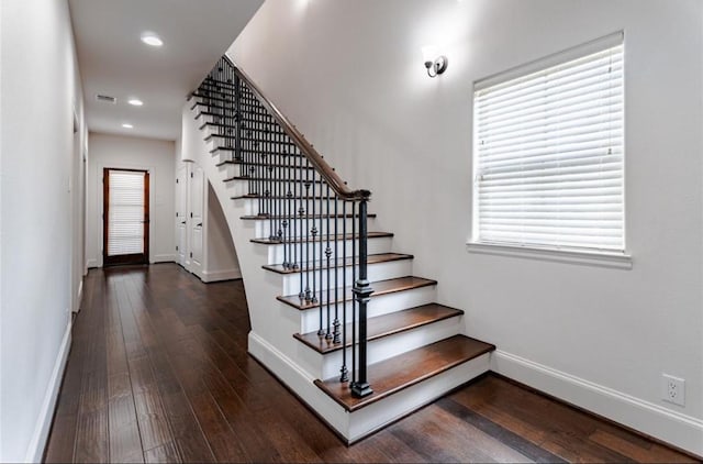 5708 Dolores St Unit A, Houston, TX 77057 - stairs featuring wood-type flooring, recessed lighting, and healthy amount of natural light