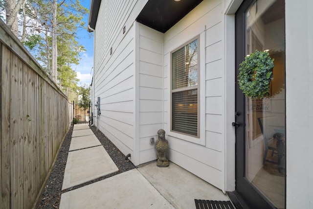 5361 Creekmont Oaks Ln, Houston, TX 77091 - property entrance with a patio area and a gate