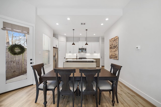 5361 Creekmont Oaks Ln, Houston, TX 77091 - dining space with light wood-type flooring and recessed lighting