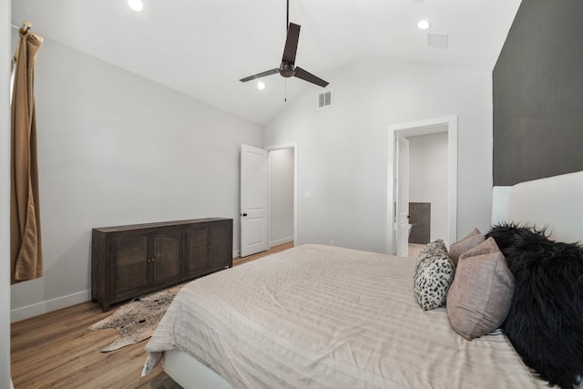 5361 Creekmont Oaks Ln, Houston, TX 77091 - bedroom with light wood-style floors, vaulted ceiling, recessed lighting, and ceiling fan