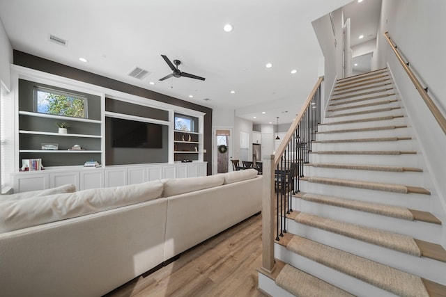 5361 Creekmont Oaks Ln, Houston, TX 77091 - living room with stairway, wood finished floors, ceiling fan, and recessed lighting