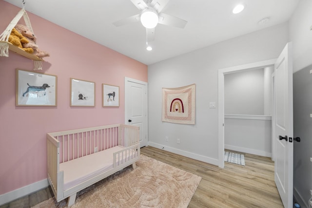 5361 Creekmont Oaks Ln, Houston, TX 77091 - bedroom with wood finished floors, ceiling fan, and recessed lighting