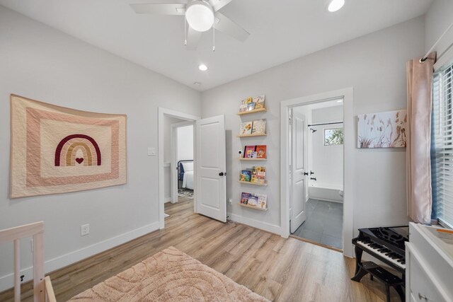 5361 Creekmont Oaks Ln, Houston, TX 77091 - bedroom featuring wood finished floors, recessed lighting, ensuite bathroom, and ceiling fan
