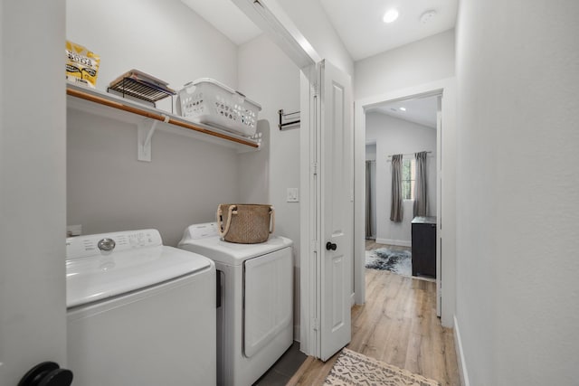 5361 Creekmont Oaks Ln, Houston, TX 77091 - washroom featuring light wood-type flooring, washing machine and dryer, and recessed lighting