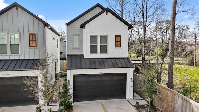 5361 Creekmont Oaks Ln, Houston, TX 77091 - modern farmhouse with a standing seam roof, board and batten siding, a metal roof, and an attached garage