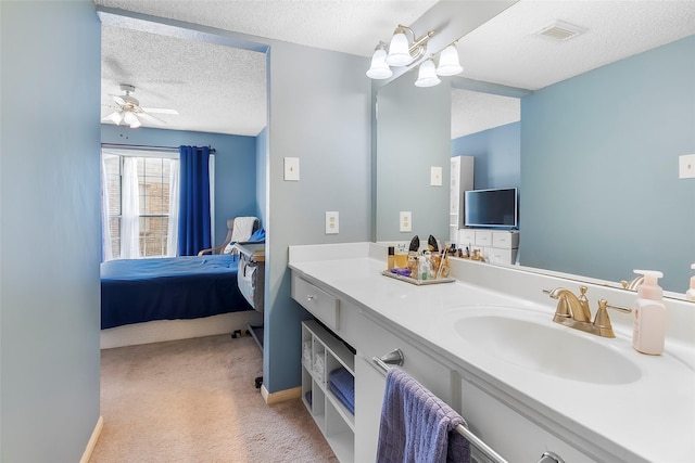 12550 Whittington Dr Unit 814, Houston, TX 77077 - bathroom featuring ensuite bath, a textured ceiling, vanity, and a ceiling fan
