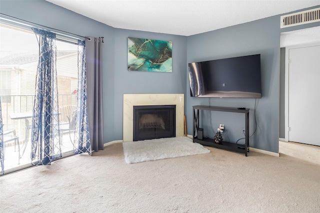 12550 Whittington Dr Unit 814, Houston, TX 77077 - carpeted living room with a premium fireplace and baseboards
