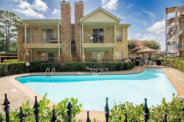 12550 Whittington Dr Unit 814, Houston, TX 77077 - community pool featuring a patio