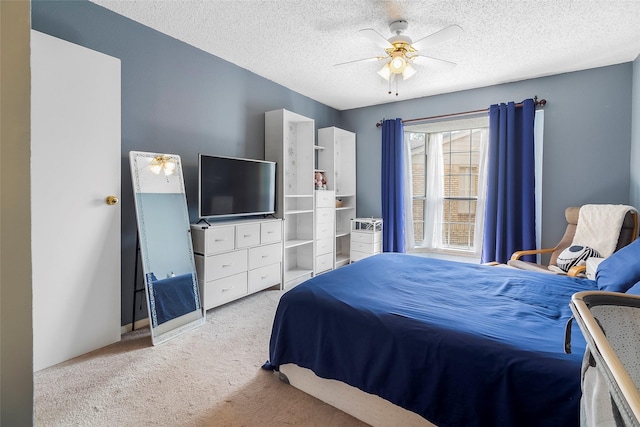 12550 Whittington Dr Unit 814, Houston, TX 77077 - carpeted bedroom with a textured ceiling and ceiling fan