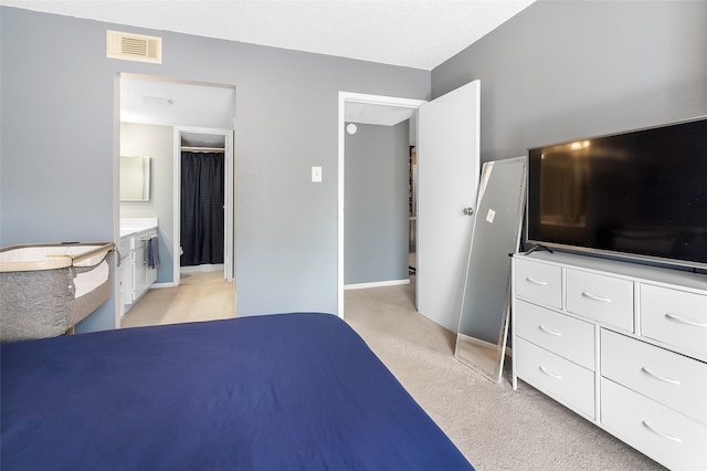 12550 Whittington Dr Unit 814, Houston, TX 77077 - bedroom featuring light carpet and baseboards