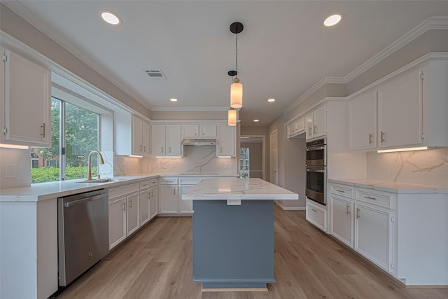 7419 Foxton Place Ct, Houston, TX 77095 - kitchen with stainless steel appliances, white cabinets, light wood finished floors, recessed lighting, and backsplash