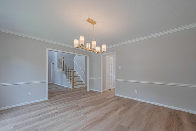 7419 Foxton Place Ct, Houston, TX 77095 - unfurnished room with a chandelier, stairs, ornamental molding, and light wood-style floors