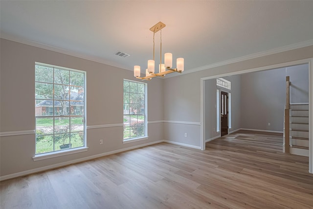 7419 Foxton Place Ct, Houston, TX 77095 - unfurnished room featuring a chandelier, plenty of natural light, crown molding, and wood finished floors