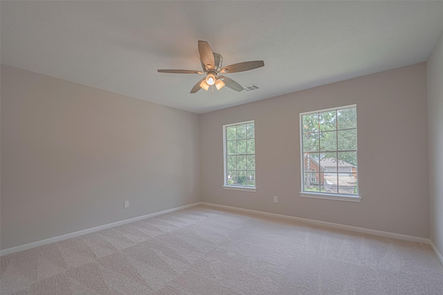 7419 Foxton Place Ct, Houston, TX 77095 - spare room featuring healthy amount of natural light, a ceiling fan, and light carpet