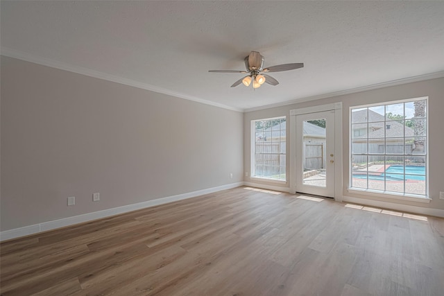 7419 Foxton Place Ct, Houston, TX 77095 - unfurnished room with wood finished floors, a ceiling fan, ornamental molding, and a textured ceiling