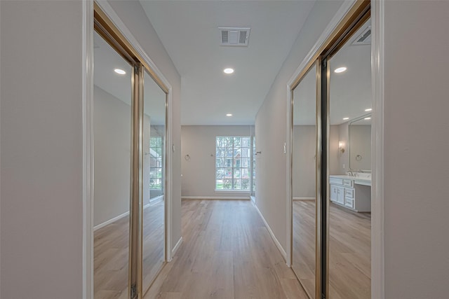 7419 Foxton Place Ct, Houston, TX 77095 - hall featuring light wood finished floors and recessed lighting