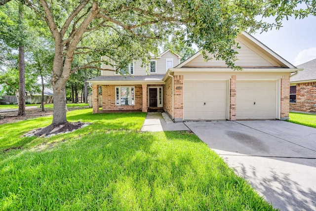 18426 Stark Point Ct, Humble, TX 77346 - view of front of house featuring a garage, brick siding, concrete driveway, and a front lawn