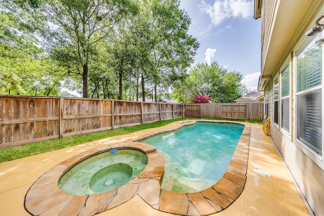 18426 Stark Point Ct, Humble, TX 77346 - view of swimming pool with an in-ground hot tub and a fenced backyard