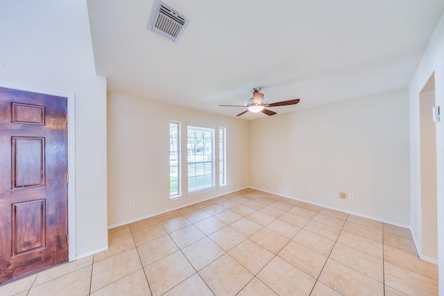 18426 Stark Point Ct, Humble, TX 77346 - spare room featuring a ceiling fan and light tile patterned flooring