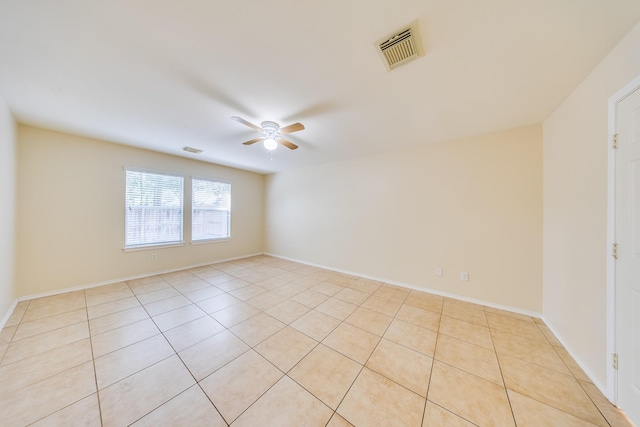 18426 Stark Point Ct, Humble, TX 77346 - spare room with ceiling fan and light tile patterned flooring