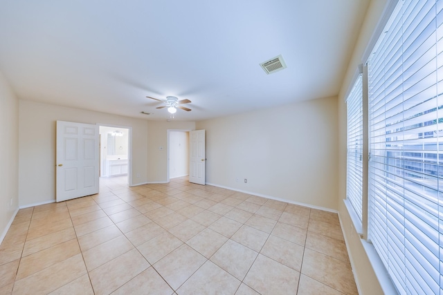 18426 Stark Point Ct, Humble, TX 77346 - spare room featuring ceiling fan and light tile patterned floors
