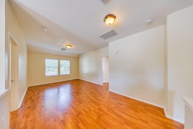 18426 Stark Point Ct, Humble, TX 77346 - unfurnished room featuring a smoke detector and light wood-style flooring