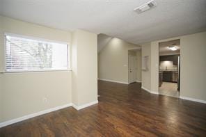 6601 Sands Point Dr Unit 59, Houston, TX 77074 - unfurnished room with wood finished floors and baseboards