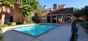 6601 Sands Point Dr Unit 59, Houston, TX 77074 - outdoor pool with a patio